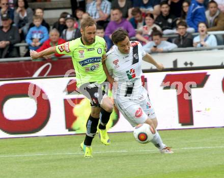 Fussball Bundesliga. RZ Pellets WAC gegen SK Puntigamer Sturm Graz.  Dario Baldauf,  (WAC), Martin Ehrenreich (Graz). Wolfsberg, am 16.5.2015.
Foto: Kuess

---
pressefotos, pressefotografie, kuess, qs, qspictures, sport, bild, bilder, bilddatenbank