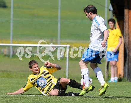 Fussball 1. Klasse Unteres Play Off. Oberes Moelltal gegen Stall. Michael Josef Stolz,  (Oberes Moelltal), Oliver Kollmitzer (Stall). Rangersdorf, am 16.5.2015.
Foto: Kuess
---
pressefotos, pressefotografie, kuess, qs, qspictures, sport, bild, bilder, bilddatenbank