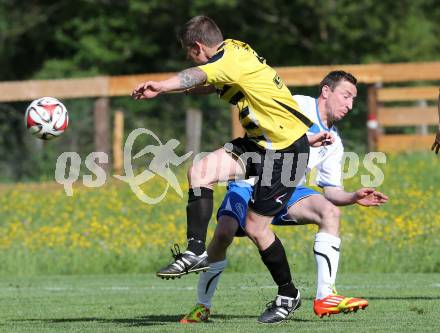 Fussball 1. Klasse Unteres Play Off. Oberes Moelltal gegen Stall.  Gerhard Reichhold, (Oberes Moelltal), Oliver Kollmitzer (Stall). Rangersdorf, am 16.5.2015.
Foto: Kuess
---
pressefotos, pressefotografie, kuess, qs, qspictures, sport, bild, bilder, bilddatenbank