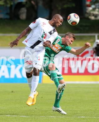 Fussball Bundesliga. RZ Pellets WAC gegen SK Rapid Wien. De Oliveira Silvio Carlos,  (WAC), Maximilian Hofmann (Wien). Wolfsberg, am 16.5.2015.
Foto: Kuess

---
pressefotos, pressefotografie, kuess, qs, qspictures, sport, bild, bilder, bilddatenbank