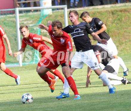 Fussball. Kaerntner Liga. Ferlach Atus gegen Gmuend. Alexander Krainer (Ferlach),   Kevin Matthias Winkler (Gmuend). Ferlach, 13.6.2015.
Foto: Kuess
---
pressefotos, pressefotografie, kuess, qs, qspictures, sport, bild, bilder, bilddatenbank