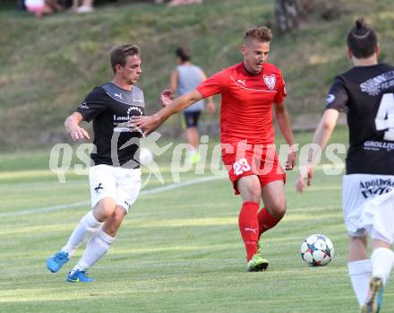 Fussball. Kaerntner Liga. Ferlach Atus gegen Gmuend. Dejan Kern (Ferlach),   Kevin Matthias Winkler (Gmuend). Ferlach, 13.6.2015.
Foto: Kuess
---
pressefotos, pressefotografie, kuess, qs, qspictures, sport, bild, bilder, bilddatenbank