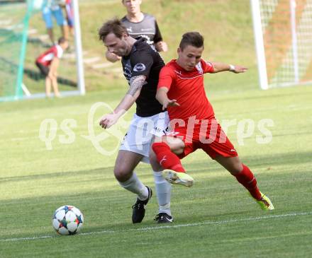 Fussball. Kaerntner Liga. Ferlach Atus gegen Gmuend. Dominik Mak (Ferlach),  Philipp Platzer (Gmuend). Ferlach, 13.6.2015.
Foto: Kuess
---
pressefotos, pressefotografie, kuess, qs, qspictures, sport, bild, bilder, bilddatenbank