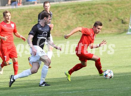 Fussball. Kaerntner Liga. Ferlach Atus gegen Gmuend. Dominik Mak (Ferlach),  Philipp Platzer (Gmuend). Ferlach, 13.6.2015.
Foto: Kuess
---
pressefotos, pressefotografie, kuess, qs, qspictures, sport, bild, bilder, bilddatenbank