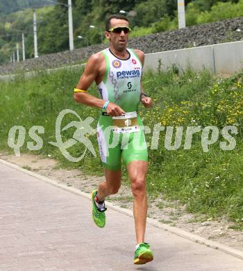 Ironman Austria. Laufen. Marino Vanhoenacker (BEL). Klagenfurt, am 28.6.2015.
Foto: Kuess
---
pressefotos, pressefotografie, kuess, qs, qspictures, sport, bild, bilder, bilddatenbank