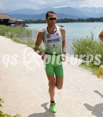 Ironman Austria. Laufen. Marino Vanhoenacker (BEL). Klagenfurt, am 28.6.2015.
Foto: Kuess
---
pressefotos, pressefotografie, kuess, qs, qspictures, sport, bild, bilder, bilddatenbank