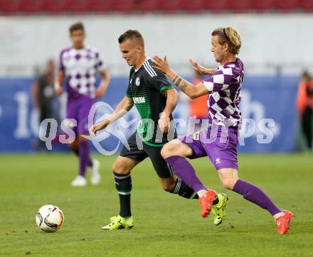 Fussball Testspiel. SK Austria Klagenfurt gegen Schalke 04. Dominik Puercher,  (Austria Klagenfurt),  Florian Pick (Schalke). Klagenfurt, am 8.7.2015.
Foto: Kuess
---
pressefotos, pressefotografie, kuess, qs, qspictures, sport, bild, bilder, bilddatenbank