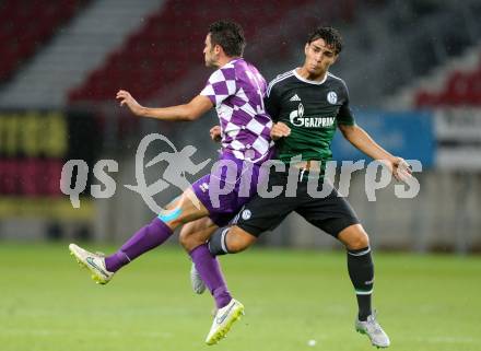 Fussball Testspiel. SK Austria Klagenfurt gegen Schalke 04. Domagoj Beslic, (Austria Klagenfurt), Ayhan Kaan  (Schalke). Klagenfurt, am 8.7.2015.
Foto: Kuess
---
pressefotos, pressefotografie, kuess, qs, qspictures, sport, bild, bilder, bilddatenbank