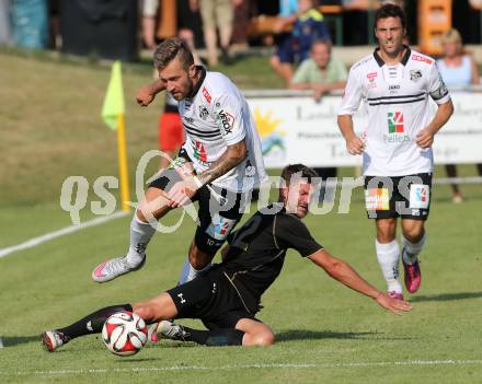 Fussball OEFB Cup. ASKOE Koettmannsdorf gegen RZ Pellets WAC.  Daniel Globotschnig,  (Koettmannsdorf), Peter Zulj (WAC). Koettmannsdorf, am 19.7.2015.
Foto: Kuess
---
pressefotos, pressefotografie, kuess, qs, qspictures, sport, bild, bilder, bilddatenbank