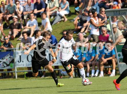 Fussball OEFB Cup. ASKOE Koettmannsdorf gegen RZ Pellets WAC.  Peter Pucker, (Koettmannsdorf), Peter Zulj (WAC). Koettmannsdorf, am 19.7.2015.
Foto: Kuess
---
pressefotos, pressefotografie, kuess, qs, qspictures, sport, bild, bilder, bilddatenbank