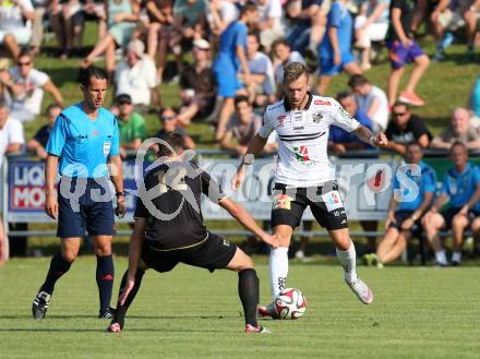 Fussball OEFB Cup. ASKOE Koettmannsdorf gegen RZ Pellets WAC.  Daniel Globotschnig, (Koettmannsdorf), Peter Zulj (WAC). Koettmannsdorf, am 19.7.2015.
Foto: Kuess
---
pressefotos, pressefotografie, kuess, qs, qspictures, sport, bild, bilder, bilddatenbank