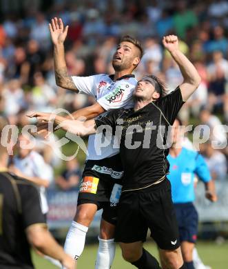 Fussball OEFB Cup. ASKOE Koettmannsdorf gegen RZ Pellets WAC.  Christoph Hubert Habith, (Koettmannsdorf), Mario Seidl (WAC). Koettmannsdorf, am 19.7.2015.
Foto: Kuess
---
pressefotos, pressefotografie, kuess, qs, qspictures, sport, bild, bilder, bilddatenbank