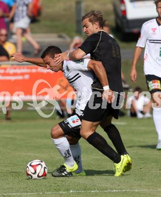 Fussball OEFB Cup. ASKOE Koettmannsdorf gegen RZ Pellets WAC.  Peter Pucker, (Koettmannsdorf), Peter Tschernegg (WAC). Koettmannsdorf, am 19.7.2015.
Foto: Kuess
---
pressefotos, pressefotografie, kuess, qs, qspictures, sport, bild, bilder, bilddatenbank