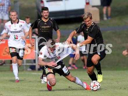 Fussball OEFB Cup. ASKOE Koettmannsdorf gegen RZ Pellets WAC.  Peter Pucker, (Koettmannsdorf), Tadej Trdina  (WAC). Koettmannsdorf, am 19.7.2015.
Foto: Kuess
---
pressefotos, pressefotografie, kuess, qs, qspictures, sport, bild, bilder, bilddatenbank