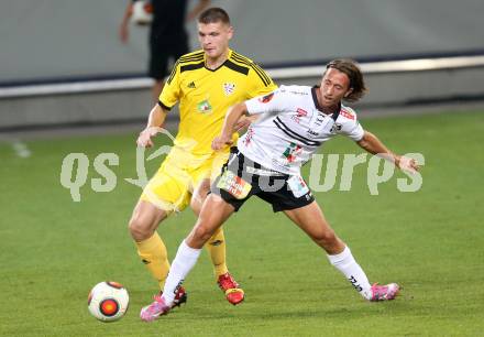 Fussball. UEFA Europa League 2015/2016. Second Qualifying Round. RZ Pellets WAC gegen FC Shakhtyor Soligorsk. Philip Hellquist, (WAC), Igor Kuzmenok (Shakhtyor Soligorsk). Klagenfurt, am 23.7.2015.
Foto: Kuess
---
pressefotos, pressefotografie, kuess, qs, qspictures, sport, bild, bilder, bilddatenbank