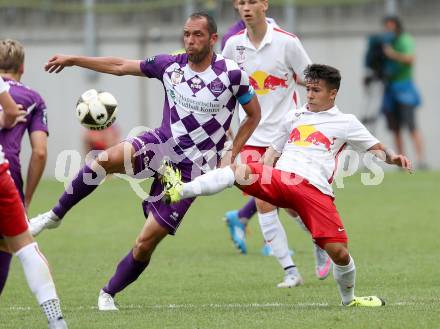 Fussball. Sky go Erste Liga. SK Austria Klagenfurt gegen FC Liefering. Christian Prawda,  (Klagenfurt), Elvis Osmani (Liefering). Klagenfurt, am 24.7.2015.
Foto: Kuess
---
pressefotos, pressefotografie, kuess, qs, qspictures, sport, bild, bilder, bilddatenbank