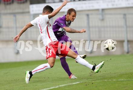 Fussball. Sky go Erste Liga. SK Austria Klagenfurt gegen FC Liefering. Rajko Rep,  (Klagenfurt), Leite Da Silva Luan (Liefering). Klagenfurt, am 24.7.2015.
Foto: Kuess
---
pressefotos, pressefotografie, kuess, qs, qspictures, sport, bild, bilder, bilddatenbank