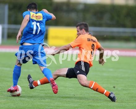 Fussball Unterliga West. VSV gegen Dellach/Drau. Marko Spanic,  (VSV),  Thomas Pirker (Dellach). Villach Lind, am 1.8.2015.
Foto: Kuess
---
pressefotos, pressefotografie, kuess, qs, qspictures, sport, bild, bilder, bilddatenbank