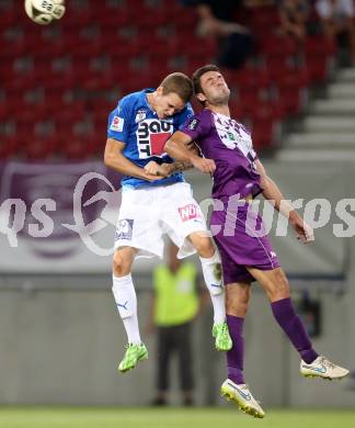 Fussball. Sky go Erste Liga. SK Austria Klagenfurt gegen SC Wiener Neustadt. Domagoj Beslic,  (Klagenfurt), Andreas Pfingstner (Wiener Neustadt). Klagenfurt, am 14.8.2015.
Foto: Kuess
---
pressefotos, pressefotografie, kuess, qs, qspictures, sport, bild, bilder, bilddatenbank