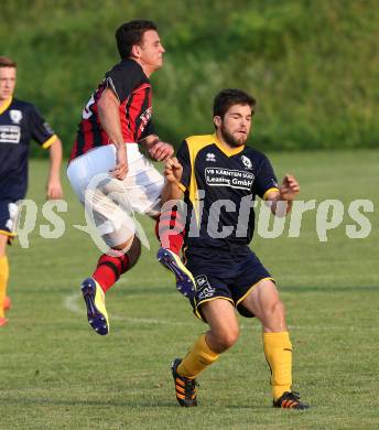 Fussball 1. Klasse D. DSG Ferlach gegen St. Margareten/Rosental. Patrick Gregoritsch,  (Ferlach), Peter Sagmeister (St.Margarethen). Unterbergen, am 14.8.2015.
Foto: Kuess
---
pressefotos, pressefotografie, kuess, qs, qspictures, sport, bild, bilder, bilddatenbank