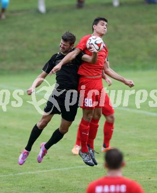 Fussball. Kaerntner Liga. Koettmannsdorf gegen Atus Ferlach. Daniel Globotschnig (Koettmannsdorf), Lukas Jaklitsch (Atus Ferlach). Koettmannsdorf, 15.8.2015.
Foto: Kuess
---
pressefotos, pressefotografie, kuess, qs, qspictures, sport, bild, bilder, bilddatenbank