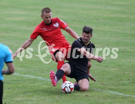 Fussball. Kaerntner Liga. Koettmannsdorf gegen Atus Ferlach. Daniel Globotschnig (Koettmannsdorf), Dejan Kern (Atus Ferlach). Koettmannsdorf, 15.8.2015.
Foto: Kuess
---
pressefotos, pressefotografie, kuess, qs, qspictures, sport, bild, bilder, bilddatenbank