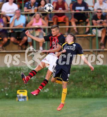 Fussball 1. Klasse D. DSG Ferlach gegen St. Margareten/Rosental. Daniel Benjamin Apachou, (Ferlach), Gregor Zugelj (St.Margarethen). Unterbergen, am 14.8.2015.
Foto: Kuess
---
pressefotos, pressefotografie, kuess, qs, qspictures, sport, bild, bilder, bilddatenbank