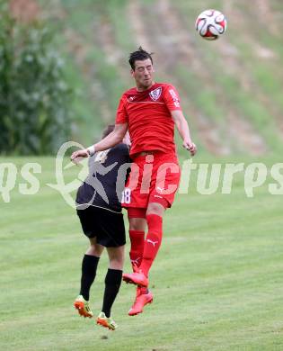 Fussball. Kaerntner Liga. Koettmannsdorf gegen Atus Ferlach. Mathias Tschofen (Koettmannsdorf), David Muenzer (Atus Ferlach). Koettmannsdorf, 15.8.2015.
Foto: Kuess
---
pressefotos, pressefotografie, kuess, qs, qspictures, sport, bild, bilder, bilddatenbank