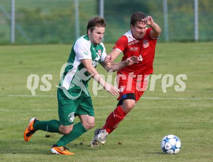 Fussball Unterliga Ost. Ludmannsdorf gegen KAC 1909.  Jernej Smukavec(Ludmannsdorf), Walter Auer (KAC). Ludmannsdorf, am 23.8.2015.
Foto: Kuess
---
pressefotos, pressefotografie, kuess, qs, qspictures, sport, bild, bilder, bilddatenbank