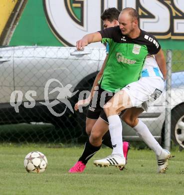 Fussball 1. KLasse A. Greifenburg gegen Kirchbach. Marcel Pirker, (Greifenburg),  Fabian Hohenwarter (Kirchbach). Greifenburg, am 22.8.2015.
Foto: Kuess
---
pressefotos, pressefotografie, kuess, qs, qspictures, sport, bild, bilder, bilddatenbank