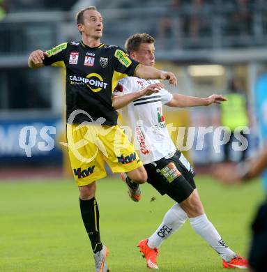 Fussball tipico Bundesliga. RZ Pellets WAC gegen Cashpoint SCR Altach. Daniel Drescher,  (WAC), Johannes Aigner (Altach). Wolfsberg, am 30.8.2015.
Foto: Kuess
---
pressefotos, pressefotografie, kuess, qs, qspictures, sport, bild, bilder, bilddatenbank