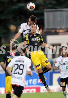 Fussball tipico Bundesliga. RZ Pellets WAC gegen Cashpoint SCR Altach. Daniel Drescher, (WAC), Johannes Aigner  (Altach). Wolfsberg, am 30.8.2015.
Foto: Kuess
---
pressefotos, pressefotografie, kuess, qs, qspictures, sport, bild, bilder, bilddatenbank