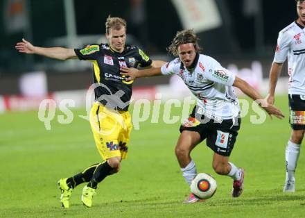 Fussball tipico Bundesliga. RZ Pellets WAC gegen Cashpoint SCR Altach. Philip Hellquist,  (WAC),   Jan Zwischenbrugger (Altach). Wolfsberg, am 30.8.2015.
Foto: Kuess
---
pressefotos, pressefotografie, kuess, qs, qspictures, sport, bild, bilder, bilddatenbank