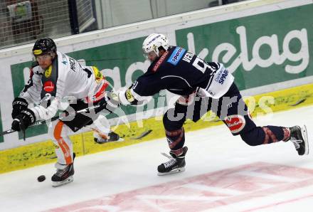 EBEL. Eishockey Bundesliga. EC VSV gegen Dornbirner Eishockey Club.  Miha Verlic,  (VSV), Andrew Mackenzie (Dornbirn). Villach, am 12.9.2015.
Foto: Kuess 


---
pressefotos, pressefotografie, kuess, qs, qspictures, sport, bild, bilder, bilddatenbank