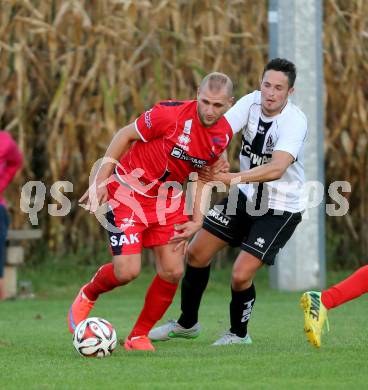 Fussball Kaerntner Liga. Kuehnsdorf gegen SAK. Thorsten Wintschnig,   (Kuehnsdorf), Christian Dlopst, (SAK). Kuehnsdorf, am 12.9.2015.
Foto: Kuess
---
pressefotos, pressefotografie, kuess, qs, qspictures, sport, bild, bilder, bilddatenbank