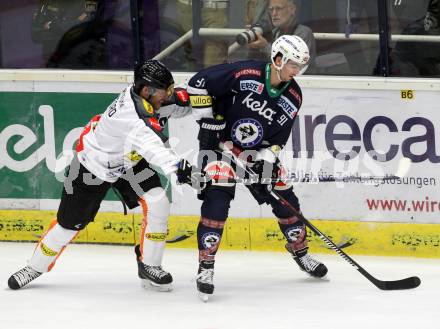 EBEL. Eishockey Bundesliga. EC VSV gegen Dornbirner Eishockey Club.  Miha Verlic,  (VSV), Nicholas Crawford (Dornbirn). Villach, am 12.9.2015.
Foto: Kuess 


---
pressefotos, pressefotografie, kuess, qs, qspictures, sport, bild, bilder, bilddatenbank