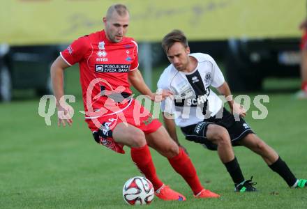 Fussball Kaerntner Liga. Kuehnsdorf gegen SAK. Pascal Doerflinger,  (Kuehnsdorf), Christian Dlopst (SAK). Kuehnsdorf, am 12.9.2015.
Foto: Kuess
---
pressefotos, pressefotografie, kuess, qs, qspictures, sport, bild, bilder, bilddatenbank