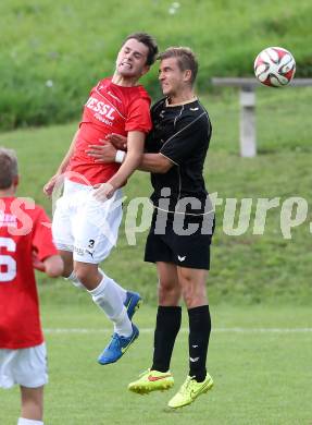 Fussball Kaerntner Liga. Koettmannsdorf gegen Gmuend. Peter Pucker (Koettmannsdorf), Nico Moser (Gmuend). Koettmannsdorf, am 13.9.2015.
Foto: Kuess
---
pressefotos, pressefotografie, kuess, qs, qspictures, sport, bild, bilder, bilddatenbank