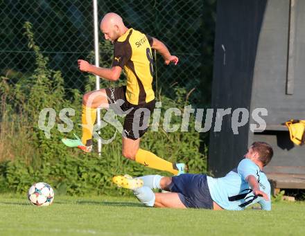 Fussball 1. Klasse D. Griffen gegen St. Margareten/Ros. Andreas Rapatz,  (Griffen), Hannes Esterle (St. Margareten). Griffen, am 12.9.2015.
Foto: Kuess
---
pressefotos, pressefotografie, kuess, qs, qspictures, sport, bild, bilder, bilddatenbank