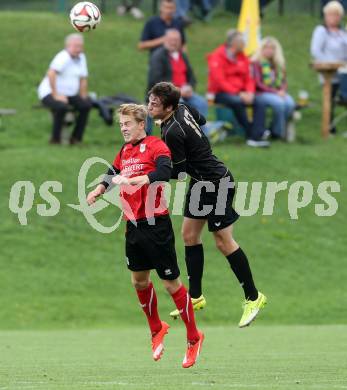 Fussball. Kaerntner Liga. Koettmannsdorf gegen Maria Saal. Stephan Borovnik (Koettmannsdorf), Nikolai Michael Kremer (Maria Saal). Koettmannsdorf, 26.9.2015.
Foto: Kuess
---
pressefotos, pressefotografie, kuess, qs, qspictures, sport, bild, bilder, bilddatenbank