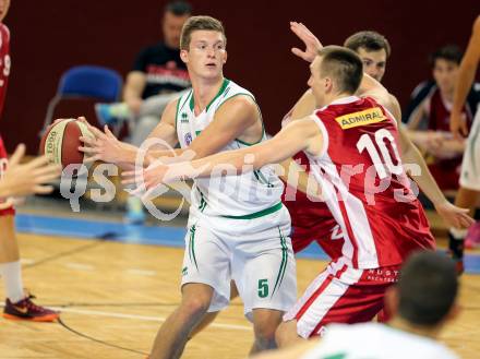 Basketball 2. Bundesliga. KOS Celovec gegen Chin Min Dragons St. Poelten.  Andi Smrtnik,  (KOS),  Andreas Bauch (St. Poelten). Klagenfurt, am 26.9.2015.
Foto: Kuess
---
pressefotos, pressefotografie, kuess, qs, qspictures, sport, bild, bilder, bilddatenbank