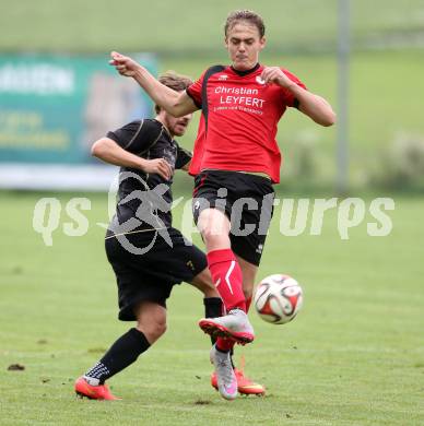 Fussball. Kaerntner Liga. Koettmannsdorf gegen Maria Saal. Jakob Orgonyi (Koettmannsdorf), Florian Heinrich (Maria Saal). Koettmannsdorf, 26.9.2015.
Foto: Kuess
---
pressefotos, pressefotografie, kuess, qs, qspictures, sport, bild, bilder, bilddatenbank