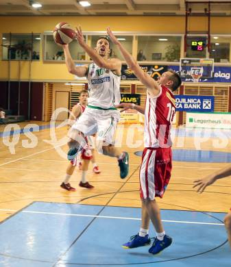 Basketball 2. Bundesliga. KOS Celovec gegen Chin Min Dragons St. Poelten.  Grega Mali, (KOS), Andreas Bauch  (St. Poelten). Klagenfurt, am 26.9.2015.
Foto: Kuess
---
pressefotos, pressefotografie, kuess, qs, qspictures, sport, bild, bilder, bilddatenbank