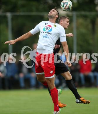 Fussball Unterliga Ost. St. Jakob/Rosental gegen Alpe Adria. Adis Osmanagic, (St. Jakob), Edvin Cirikovic (Alpe Adria). St. Jakob, am 26.9.2015.
Foto: Kuess
---
pressefotos, pressefotografie, kuess, qs, qspictures, sport, bild, bilder, bilddatenbank