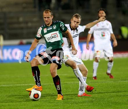 Fussball tipico Bundesliga. RZ Pellets WAC gegen SV Josko Ried. Christoph Rabitsch, (WAC), Gernot Trauner (Ried). Wolfsberg, am 3.10.2015.
Foto: Kuess
---
pressefotos, pressefotografie, kuess, qs, qspictures, sport, bild, bilder, bilddatenbank