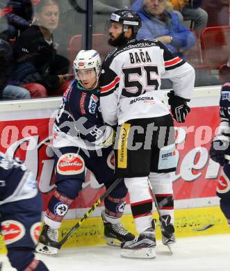 EBEL. Eishockey Bundesliga. EC VSV gegen HC Orli Znojmo.  Ryan McKiernan, (VSV), Martin Baca (Znojmo). Villach, am 27.9.2015.
Foto: Kuess 


---
pressefotos, pressefotografie, kuess, qs, qspictures, sport, bild, bilder, bilddatenbank