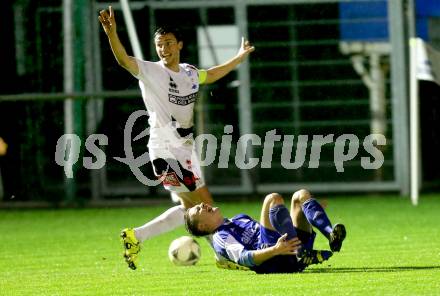 Fussball Kaerntner Liga. SAK gegen Treibach. Darjan Aleksic, (SAK), Werner Gassler (Treibach). Welzenegg, am 16.10.2015.
Foto: Kuess
---
pressefotos, pressefotografie, kuess, qs, qspictures, sport, bild, bilder, bilddatenbank