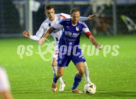 Fussball Kaerntner Liga. SAK gegen Treibach. Nico Hrstic, (SAK), Arno Paul Kozelsky  (Treibach). Welzenegg, am 16.10.2015.
Foto: Kuess
---
pressefotos, pressefotografie, kuess, qs, qspictures, sport, bild, bilder, bilddatenbank