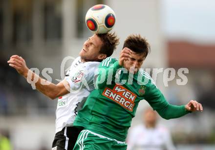 Fussball tipico Bundesliga. RZ Pellets WAC gegen SK Rapid Wien. Boris Huettenbrenner, (WAC), Matej Jelic (Rapid). Wolfsberg, am 18.10.2015.
Foto: Kuess
---
pressefotos, pressefotografie, kuess, qs, qspictures, sport, bild, bilder, bilddatenbank