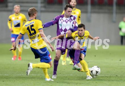 Fussball Sky go Erste Liga. SK Austria Klagenfurt gegen SKN St. Poelten.    Domagoj Beslic,  (Klagenfurt), Martin Grasegger, Michael Ambichl (St. Poelten). Klagenfurt, am 16.10.2015.
Foto: Kuess
---
pressefotos, pressefotografie, kuess, qs, qspictures, sport, bild, bilder, bilddatenbank